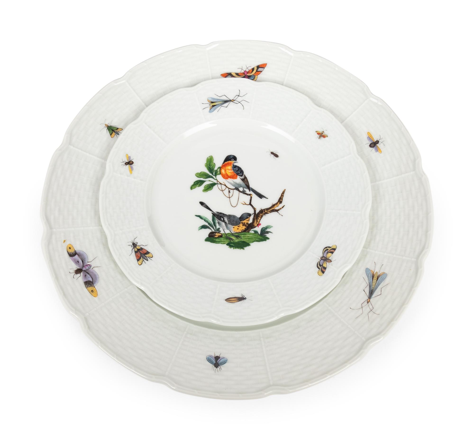 A Raynaud Limoges Porcelain Dinner Service