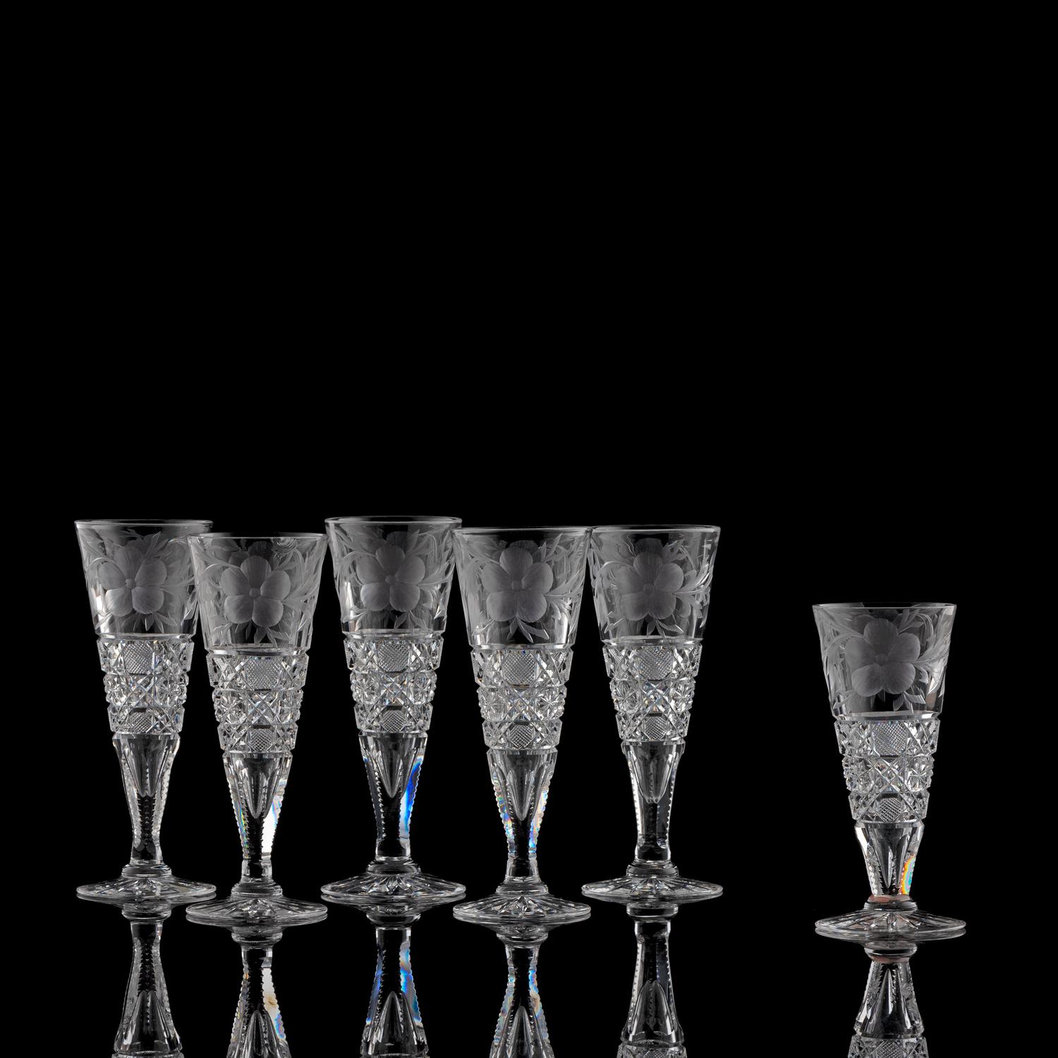 Six Tuthill "Harvard" Cut Glass Flutes with Primroses, in Two Sizes