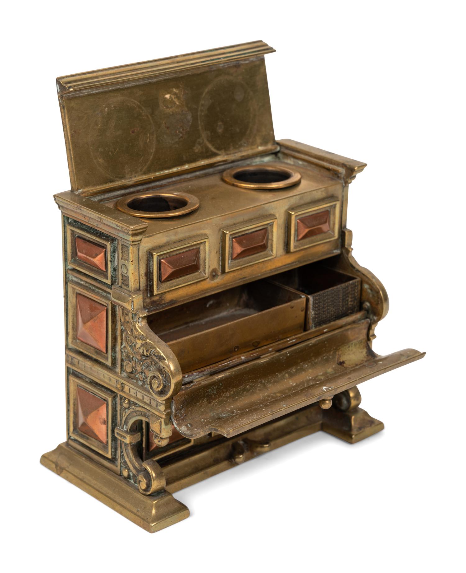 Two Piano-Form Inkwells and an English Silver Letterbox Inkwell