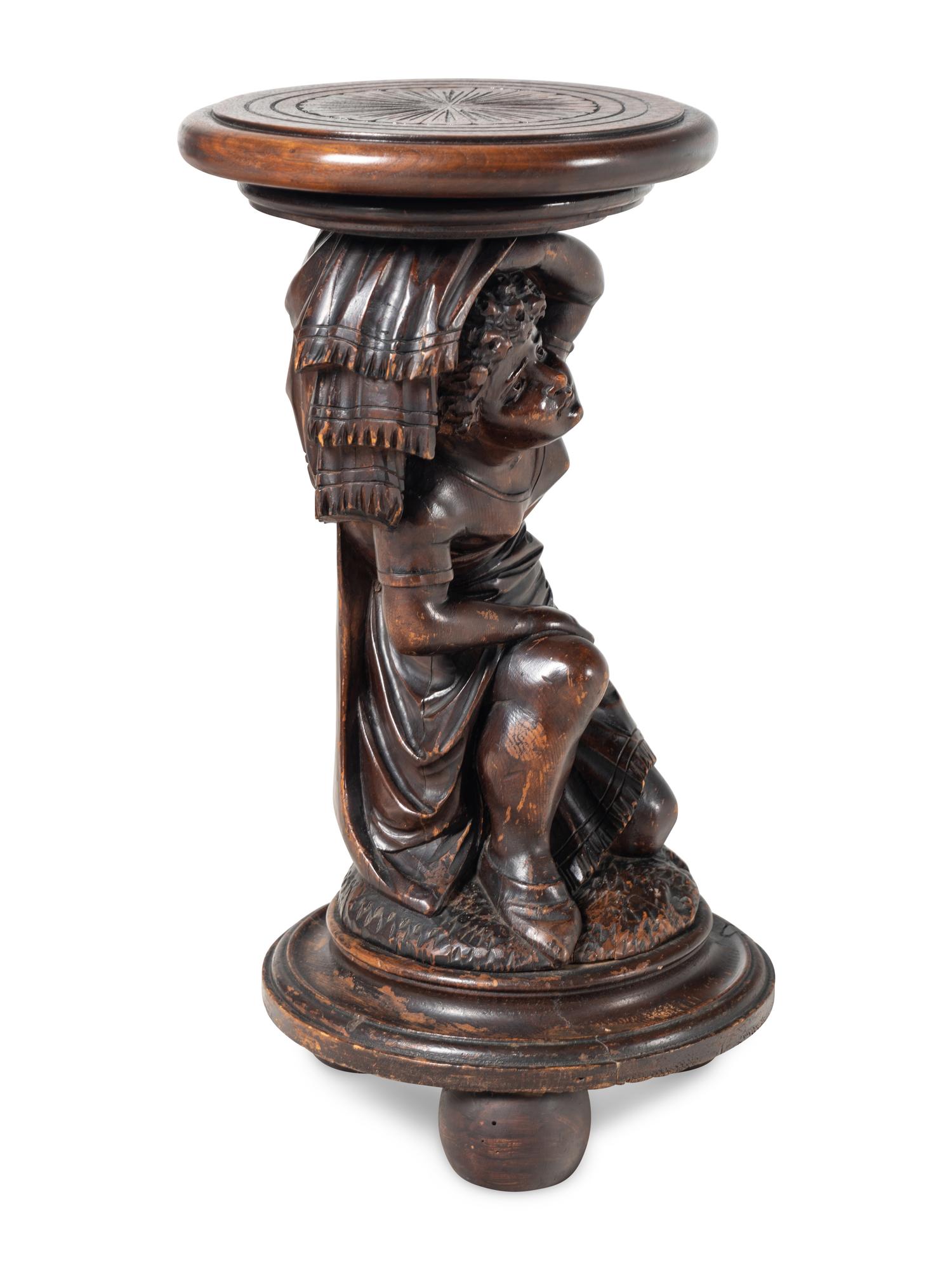 A Venetian Carved Walnut Figural Pedestal