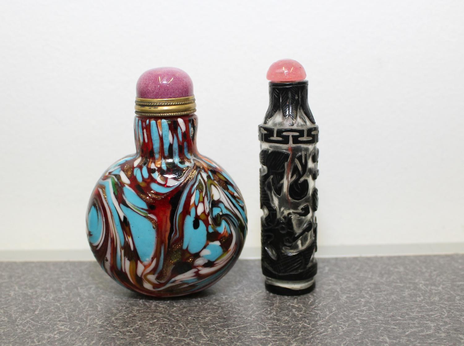 Two Glass Snuff Bottles Height of taller 3 inches.