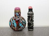 Two Glass Snuff Bottles Height of taller 3 inches.