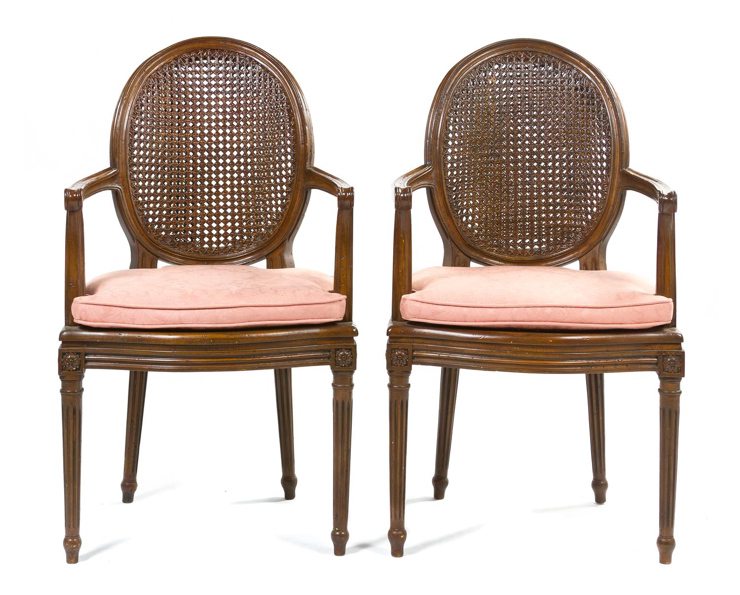 A Pair of Louis XVI Style Walnut Fauteuils, Height 38 1/2 inches.