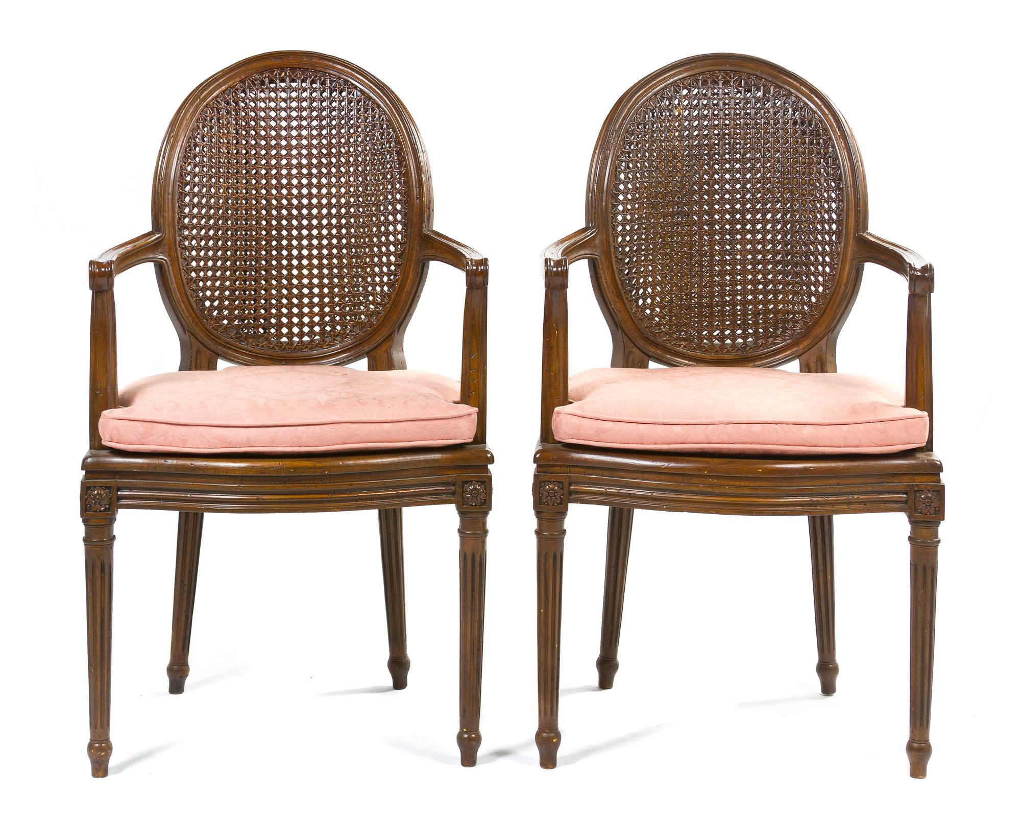 A Pair of Louis XVI Style Walnut Fauteuils, Height 38 1/2 inches.