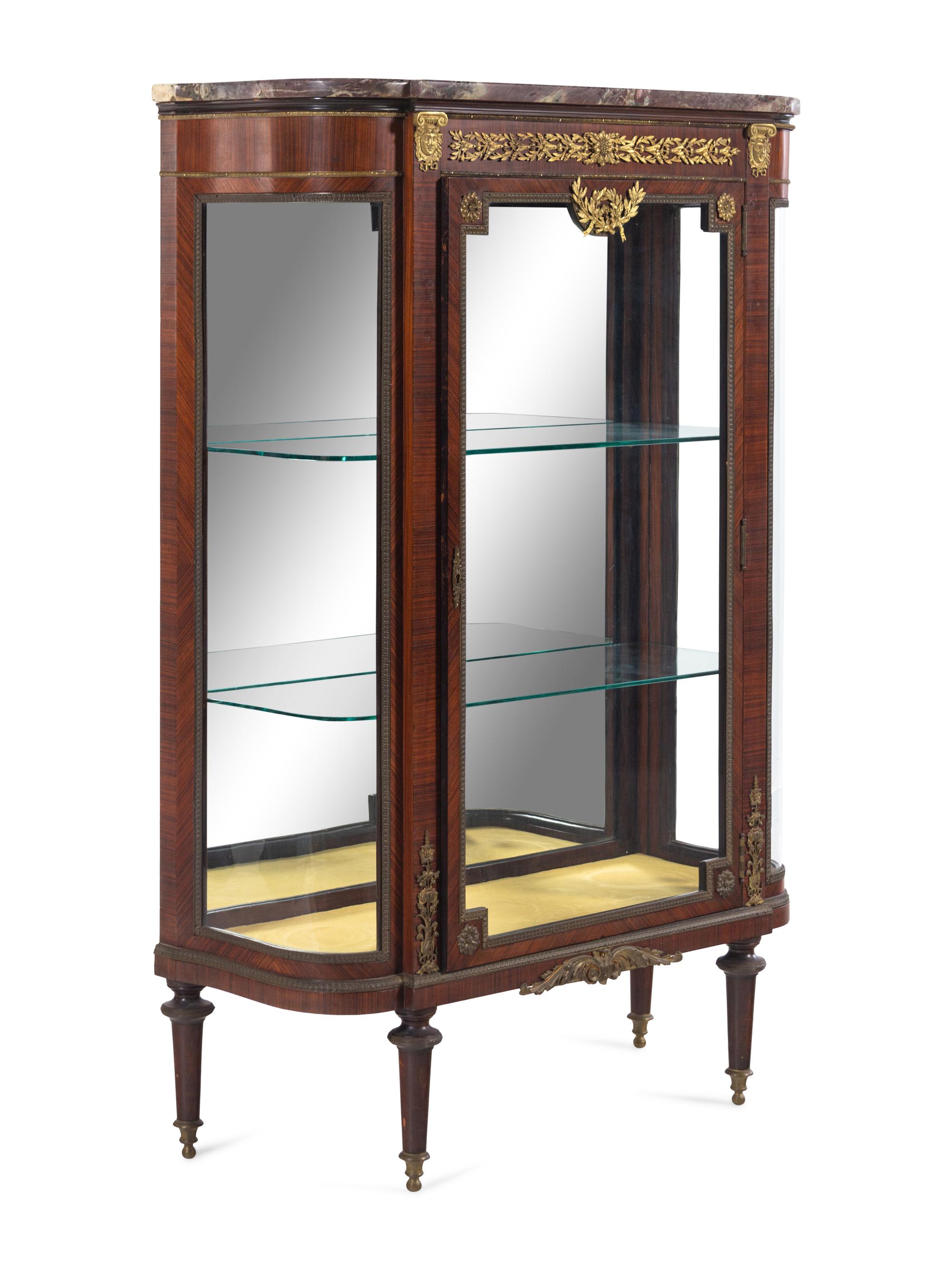A Louis XVI Style Gilt Bronze Mounted Kingwood Veneered Marble-Top Vitrine Cabinet