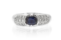 An 18 Karat White Gold, Sapphire and Diamond Ring, 6.50 dwts.