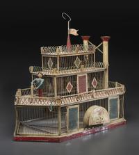 A Painted Sheet Metal and Wire Steamboat Form Birdcage