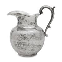A Mexican Silver Water Pitcher