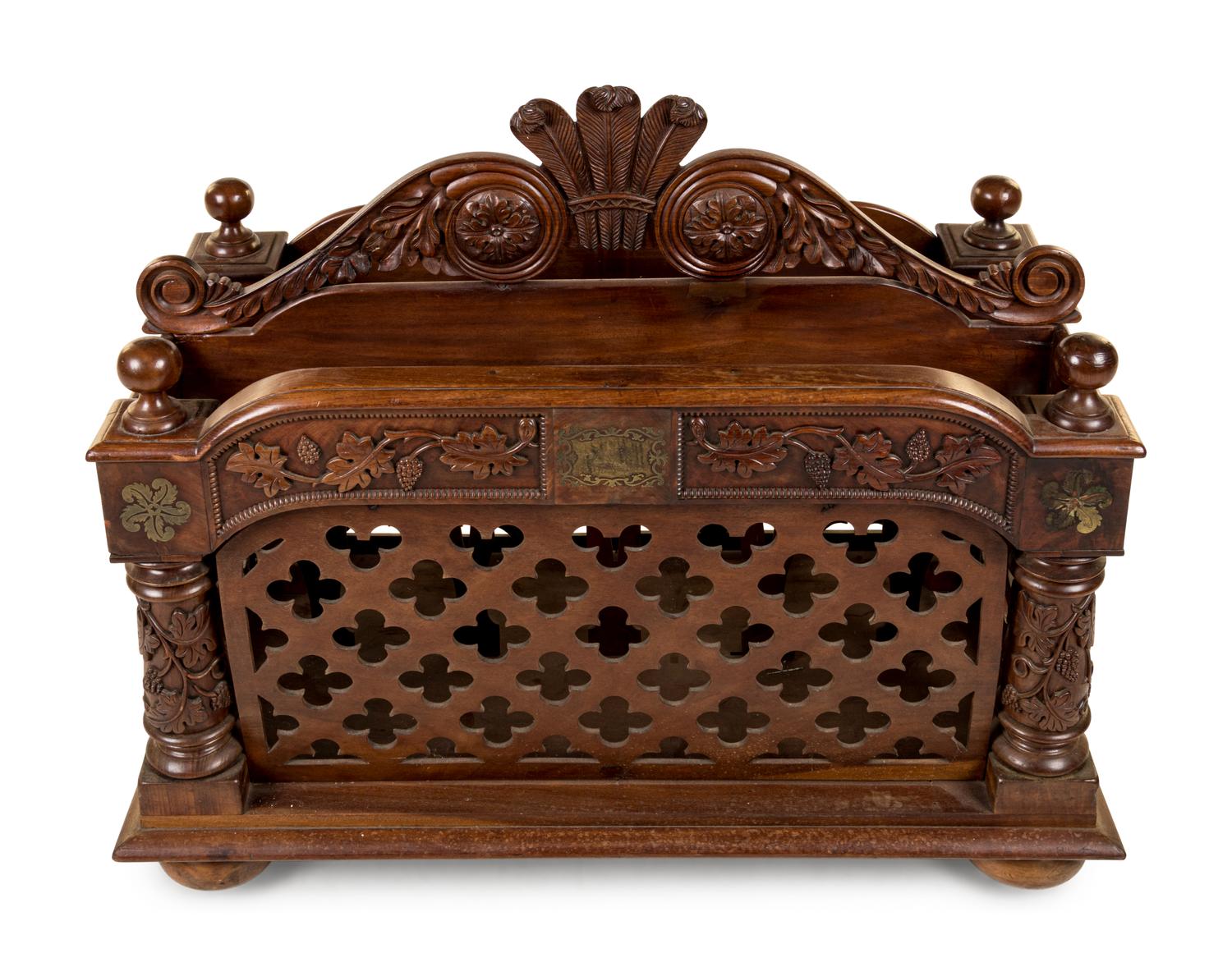 An Oversized Carved Walnut Canterbury