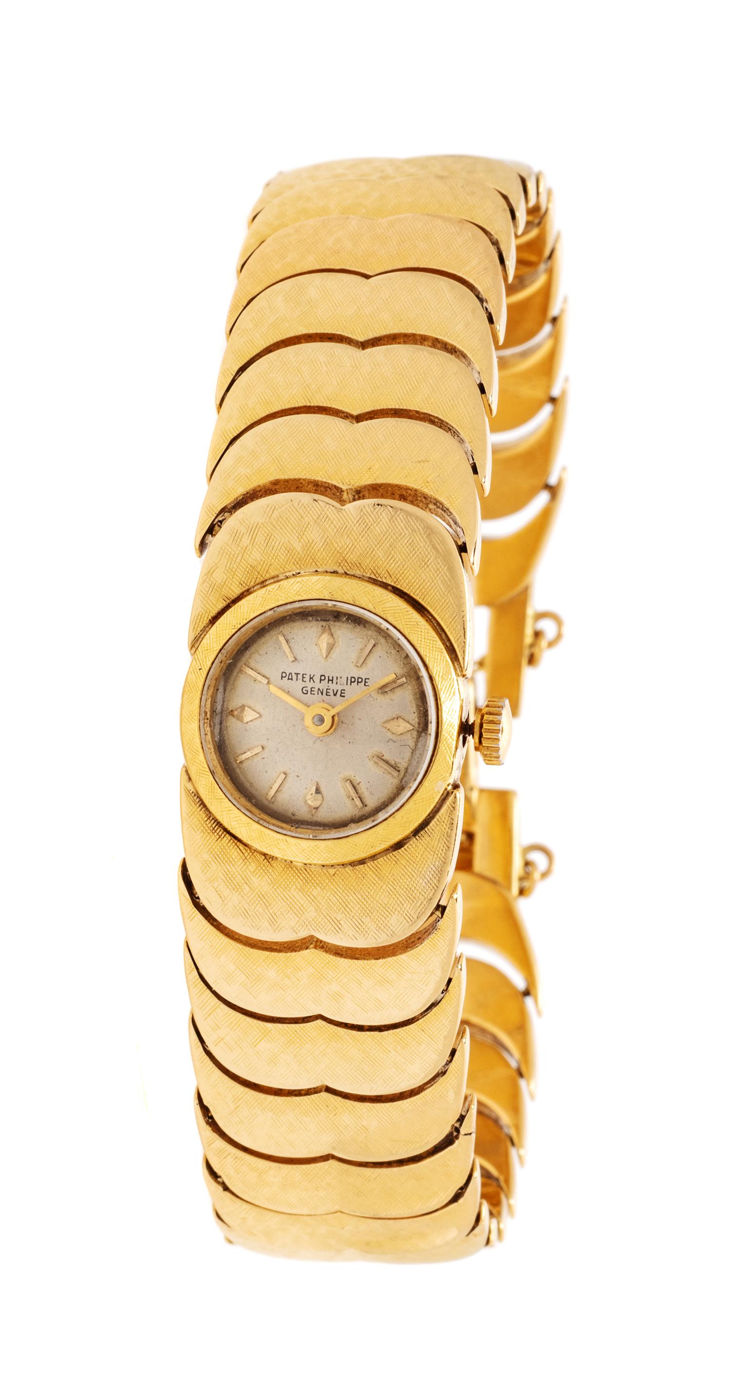 An 18 Karat Yellow Gold Wristwatch, Patek Philippe, 36.30 dwts.