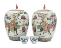 A Pair of Chinese Famille Rose Porcelain Covered Jars and A Pair of Blue and White Porcelain Bowls