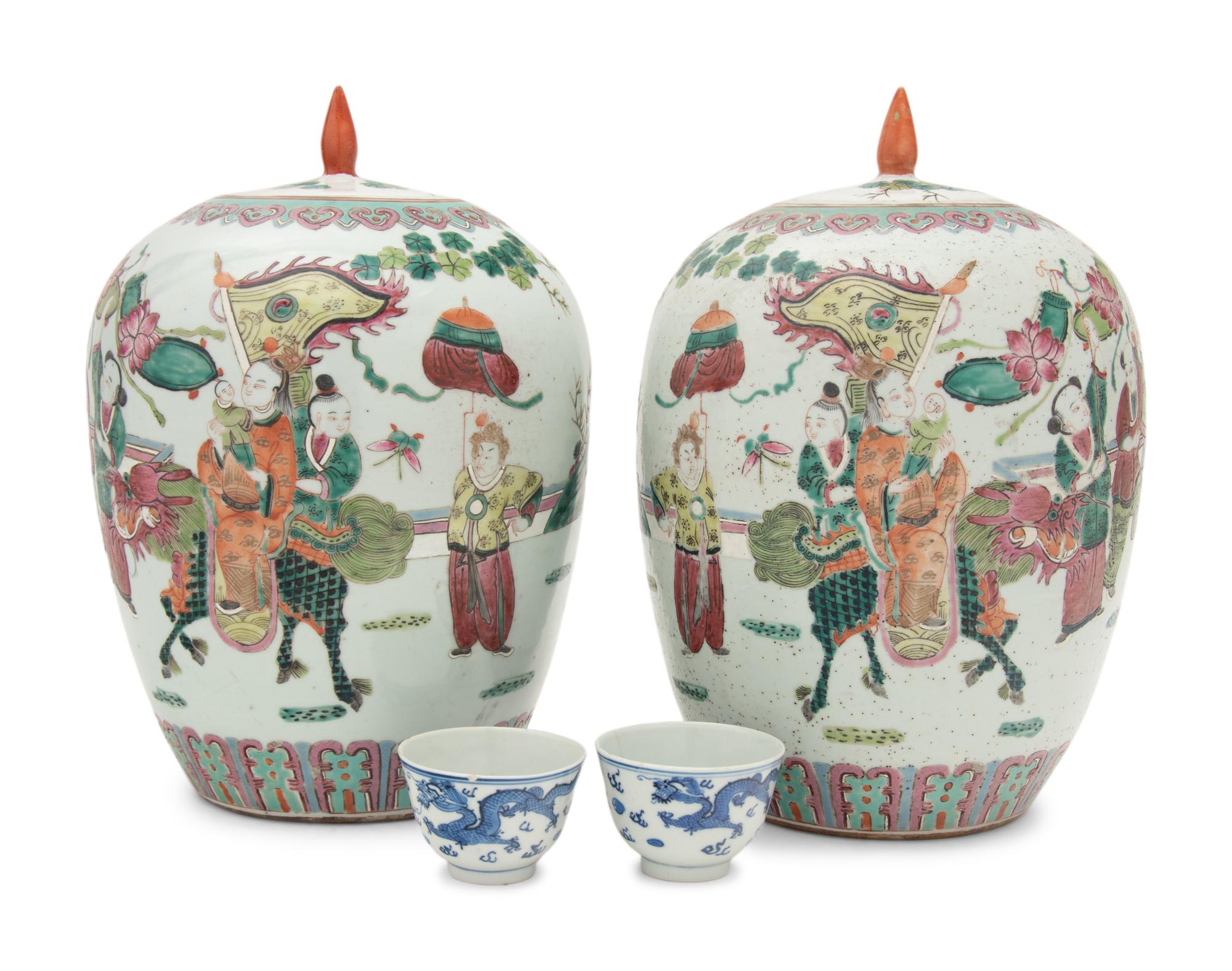 A Pair of Chinese Famille Rose Porcelain Covered Jars and A Pair of Blue and White Porcelain Bowls