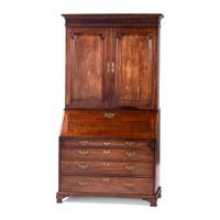 A George III Carved and Paneled Mahogany Secretary Bookcase