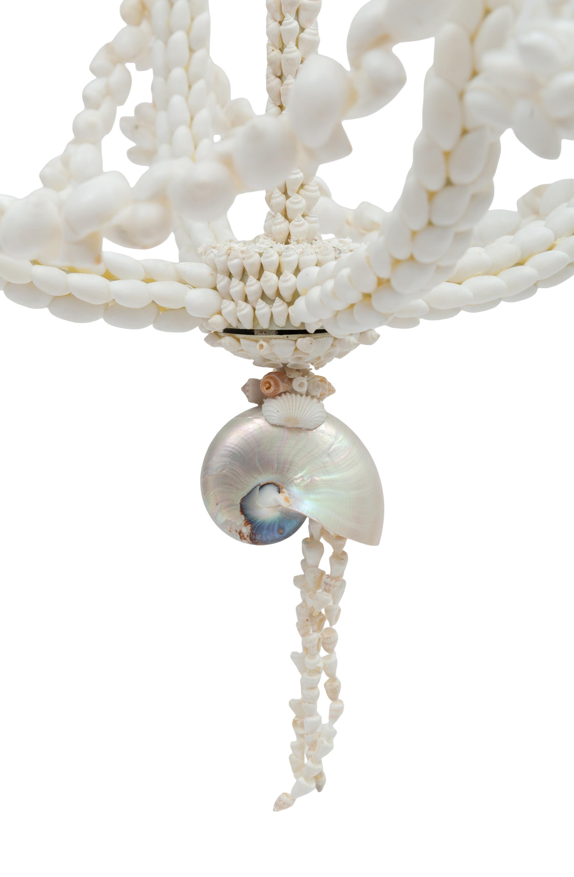A Grotto Style Shell-Encrusted Four-Light Chandelier