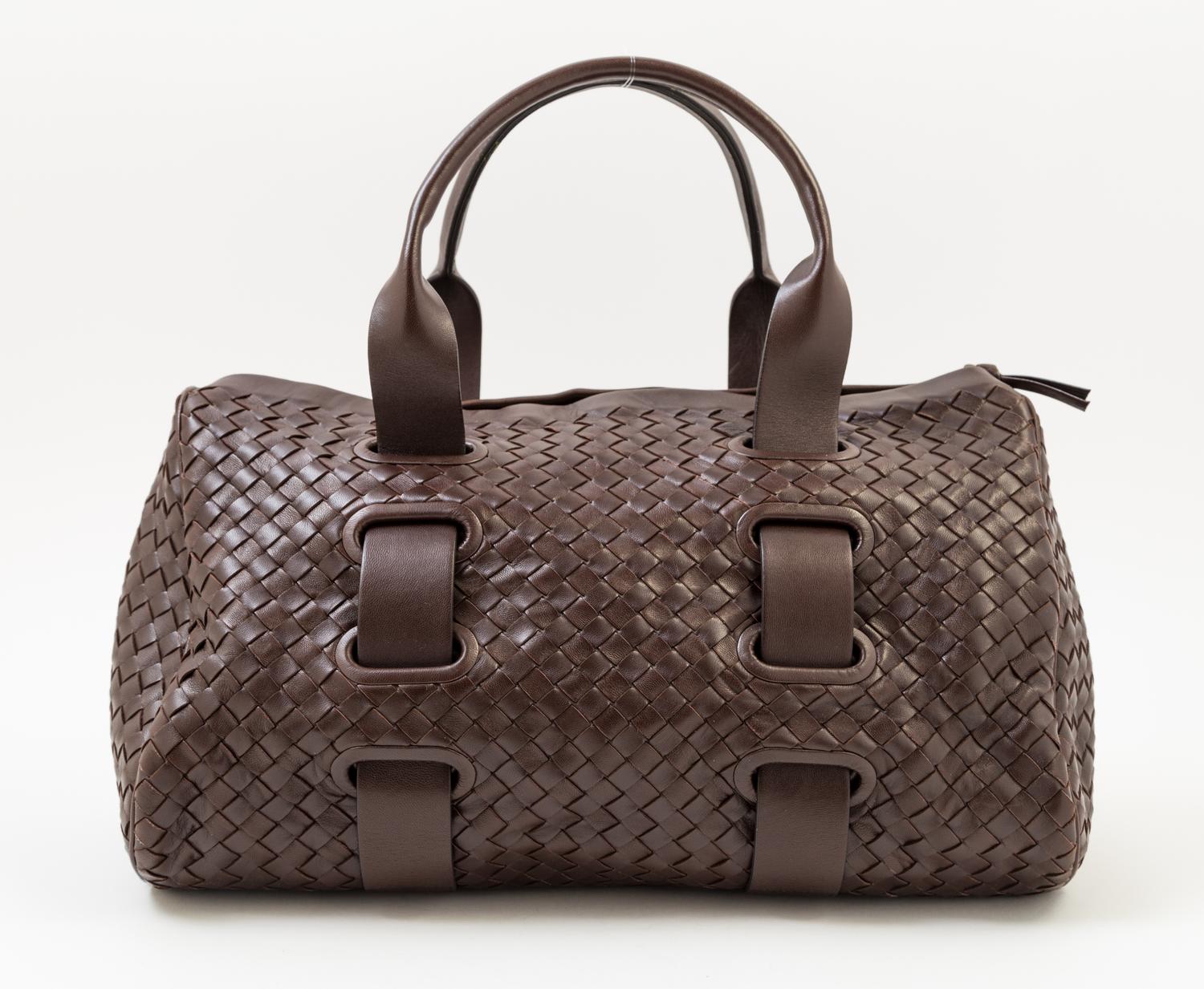 A Bottega Veneta Chocolate Intrecciato Small Duffle Bag, 14" x 9" x 7"; Handle Drop: 6".