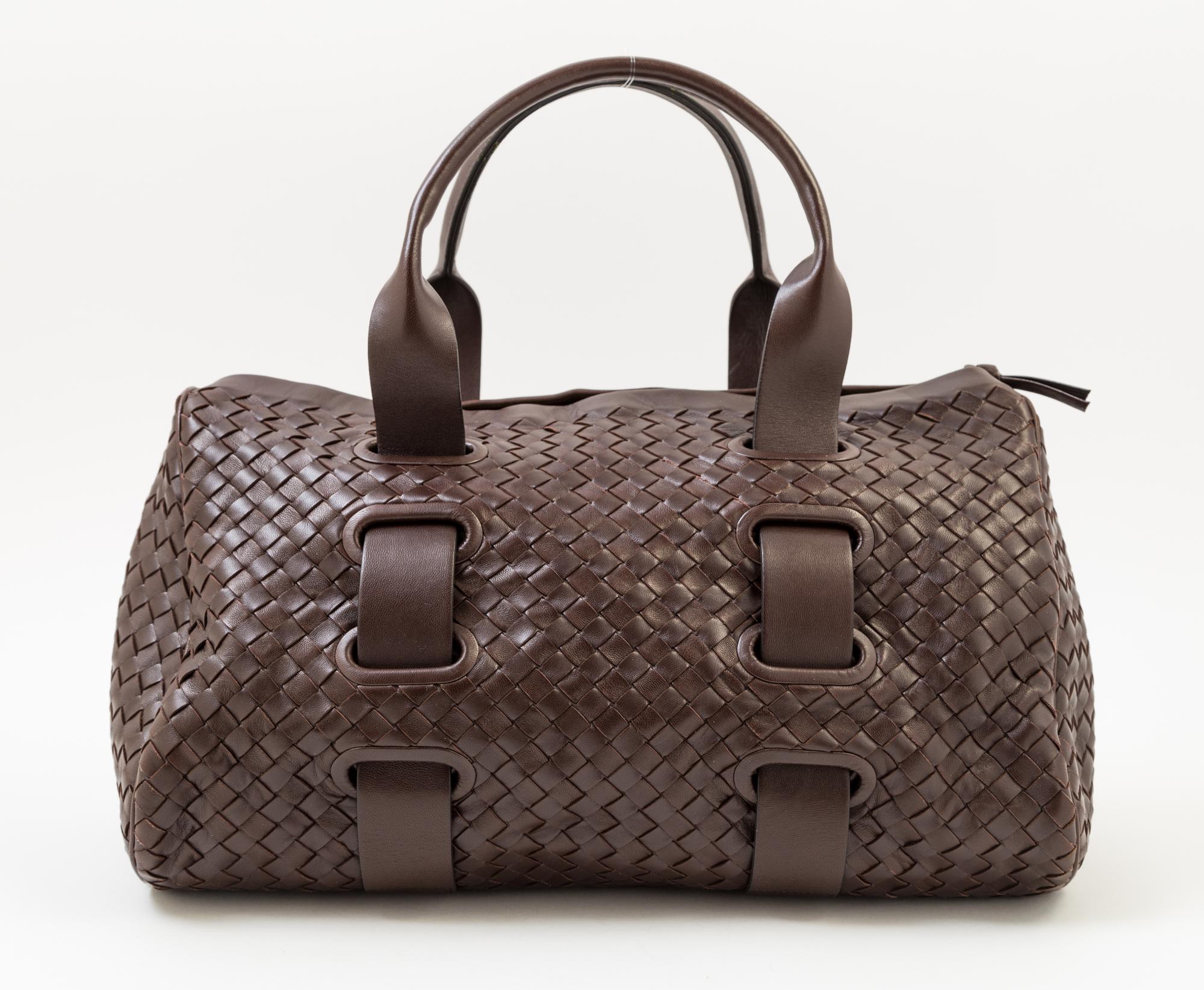 A Bottega Veneta Chocolate Intrecciato Small Duffle Bag, 14" x 9" x 7"; Handle Drop: 6".