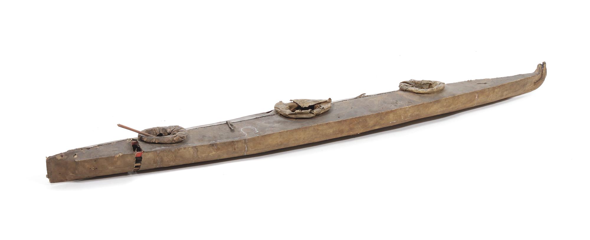 An Eskimo Model Kayak Length 63 x width 7 1/2 inches.