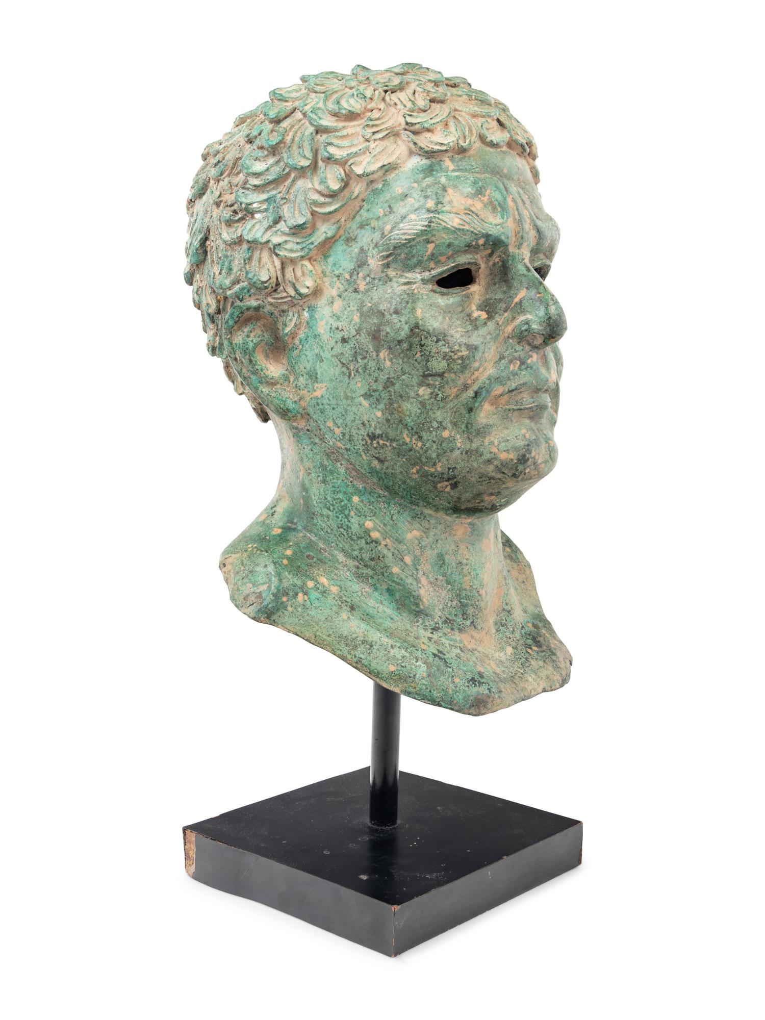 A Patinated Metal Portrait Head