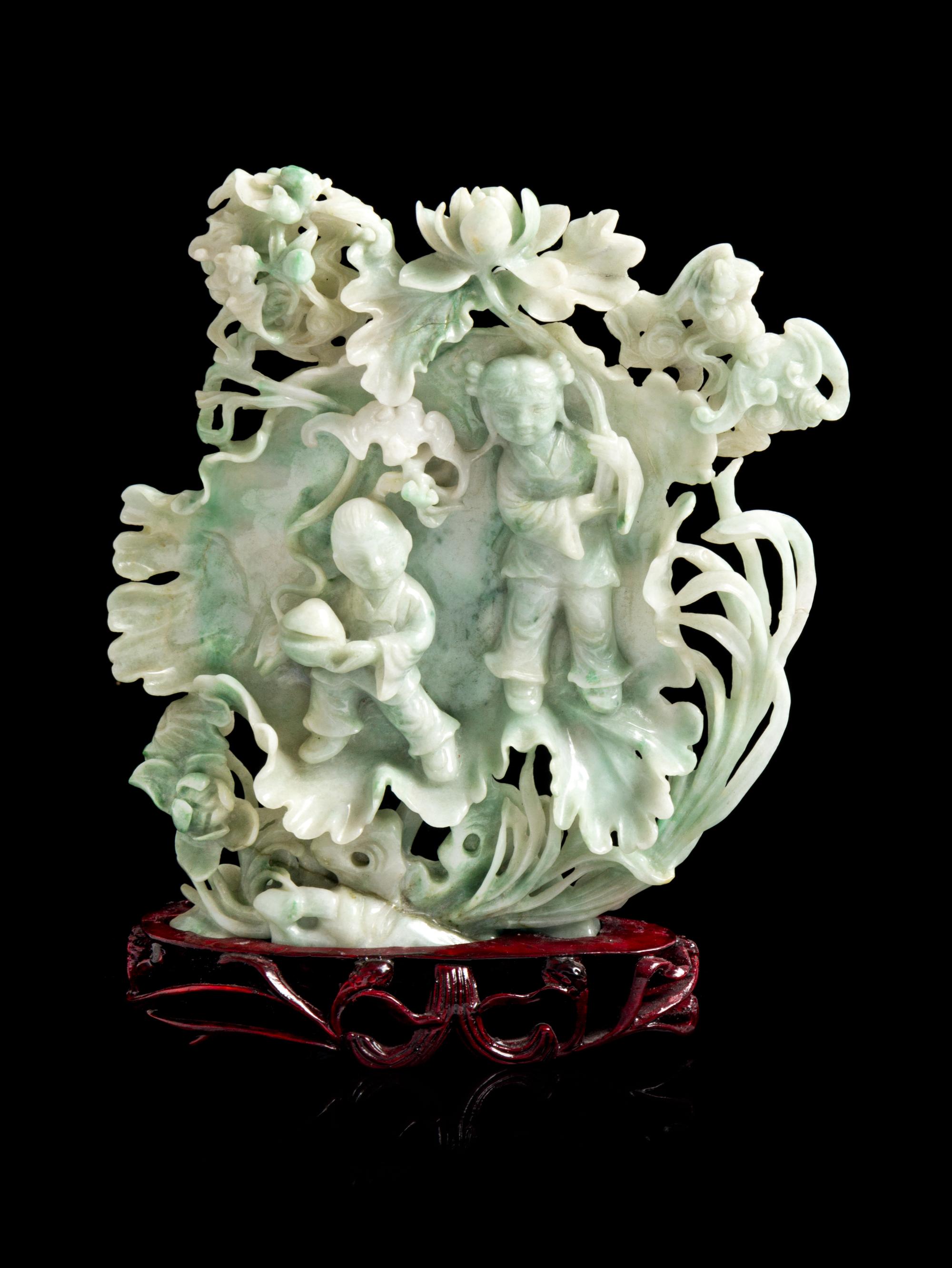 An Apple Green and Celadon Jadeite Carving Height 7 inches. — 20TH CENTURY
