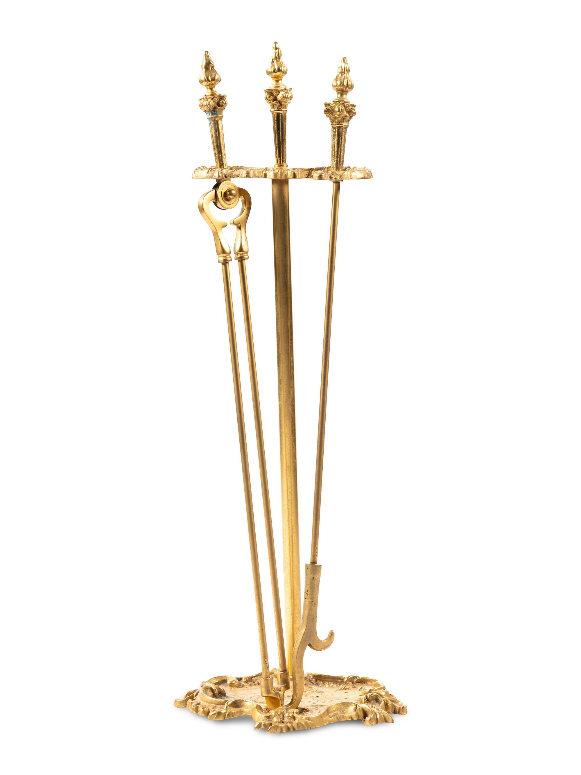 A Set of Louis XV Style Gilt Bronze Fire Tools