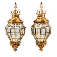 A Pair of Louis XVI Style Gilt Bronze and Glass Hall Lanterns