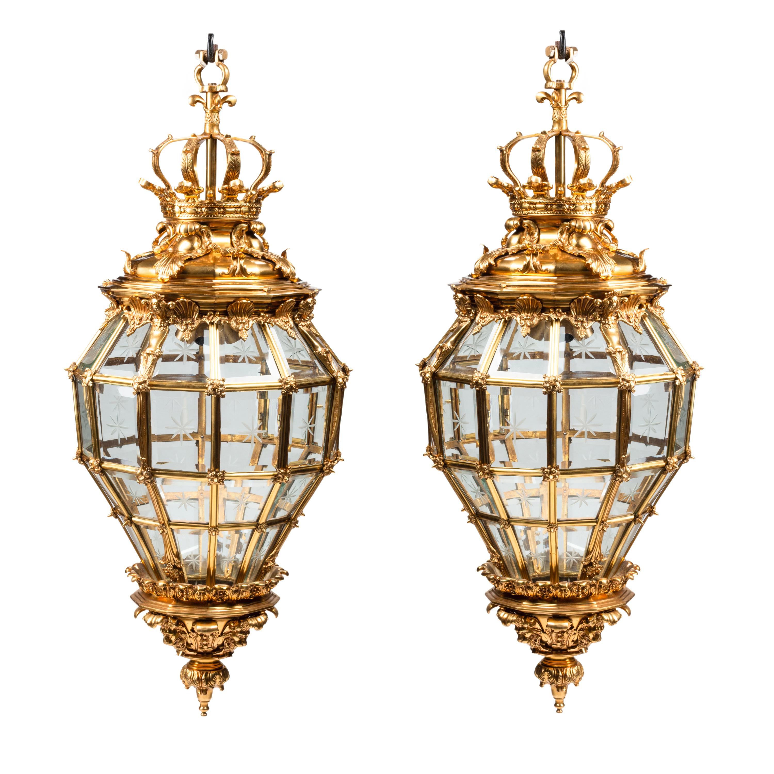 A Pair of Louis XVI Style Gilt Bronze and Glass Hall Lanterns