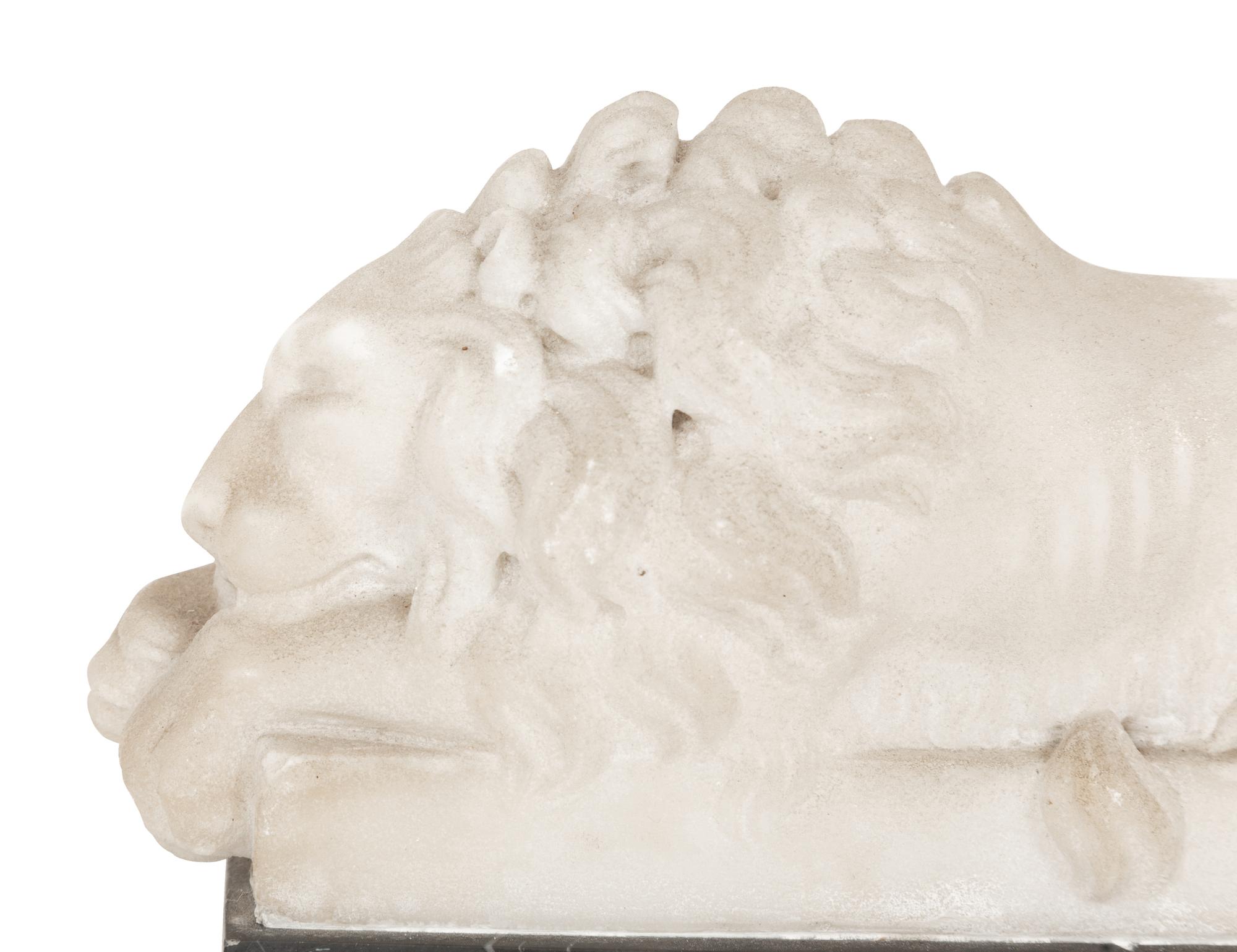 A Pair of Marble Recumbent Lion Bookends