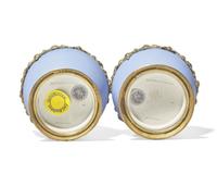 A Pair of Wedgwood Gilt Bronze Mounted Pale Blue Jasperware Vases