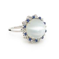 CAT'S EYE MOONSTONE, DIAMOND, AND SAPPHIRE RING