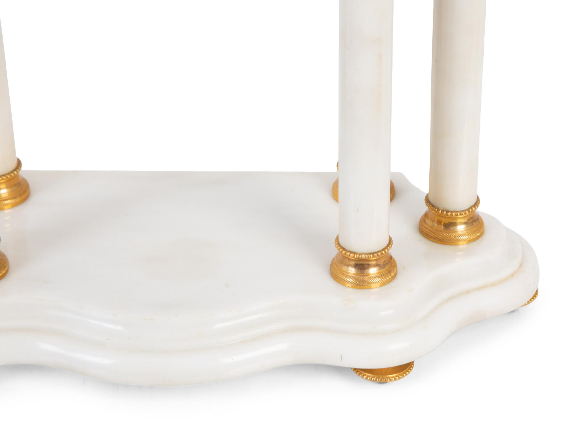 A French Gilt Bronze and White Marble Clock Garniture — 20TH CENTURY