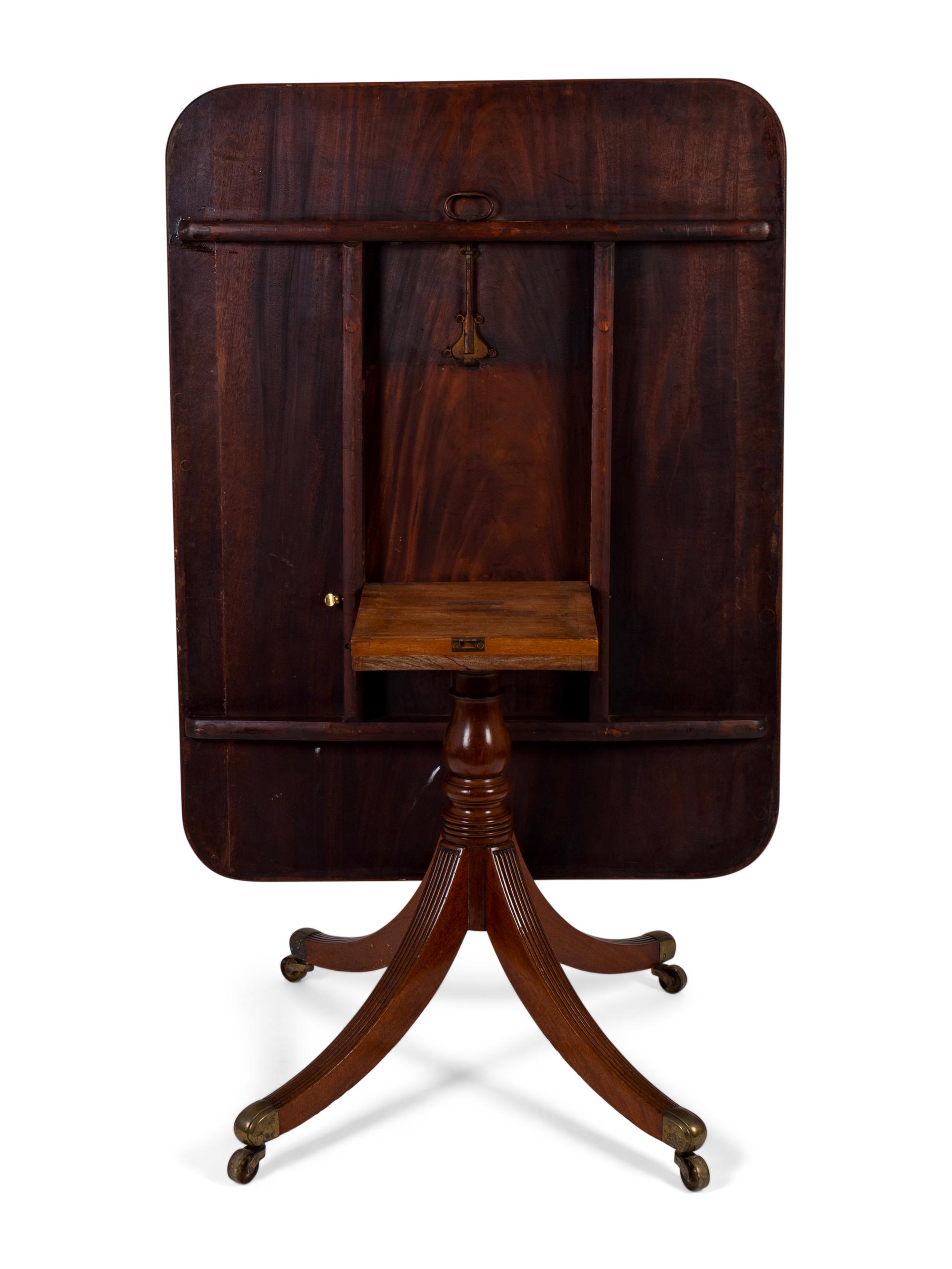 A Regency Cross-banded Mahogany Tilt-top Breakfast Table — EARLY 19TH CENTURY