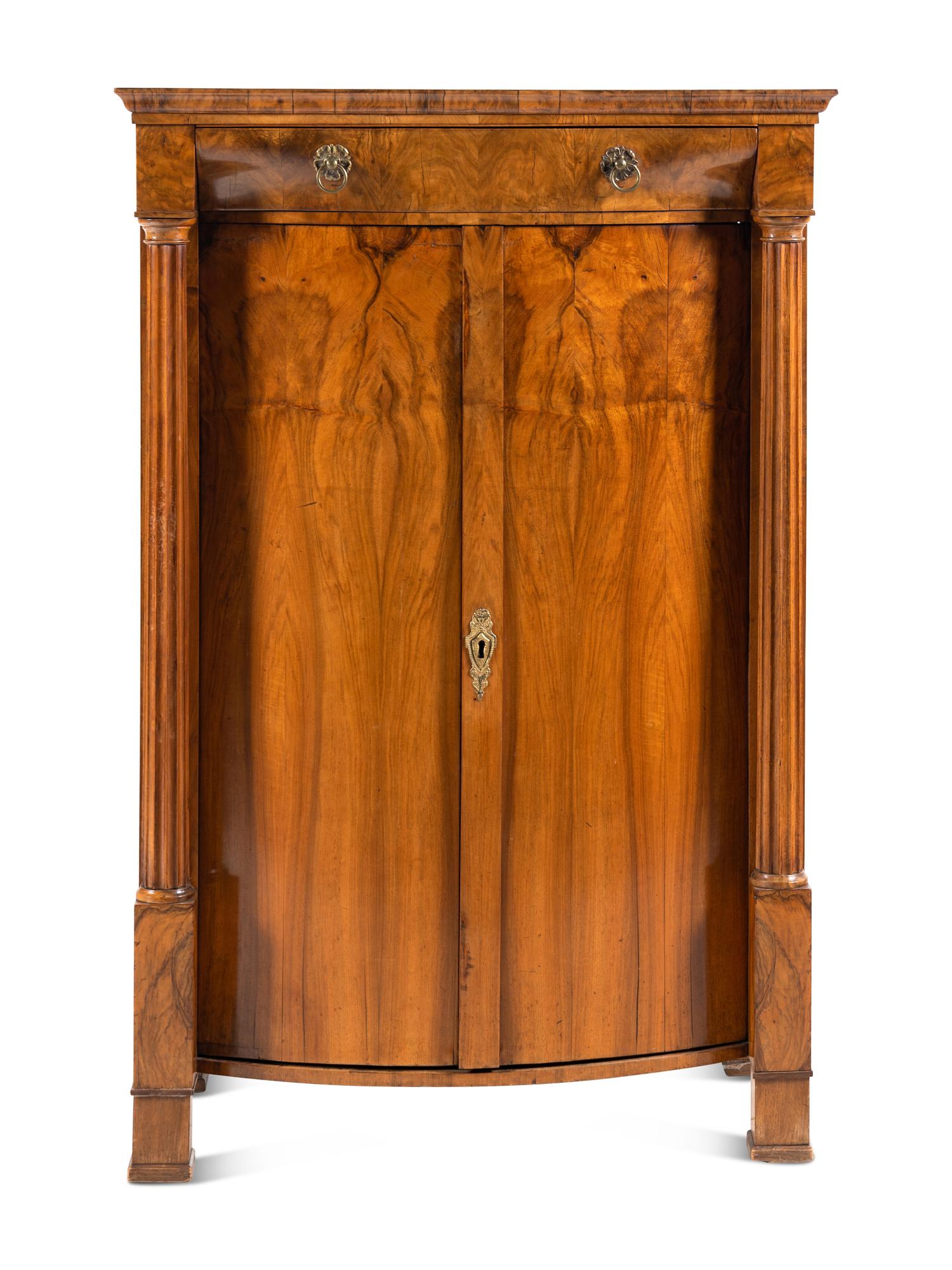 A Biedermeier Figured Walnut Cabinet