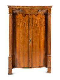 A Biedermeier Figured Walnut Cabinet