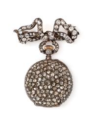 A Silver, Gold and Diamond Lapel Watch, 13.00 dwts.