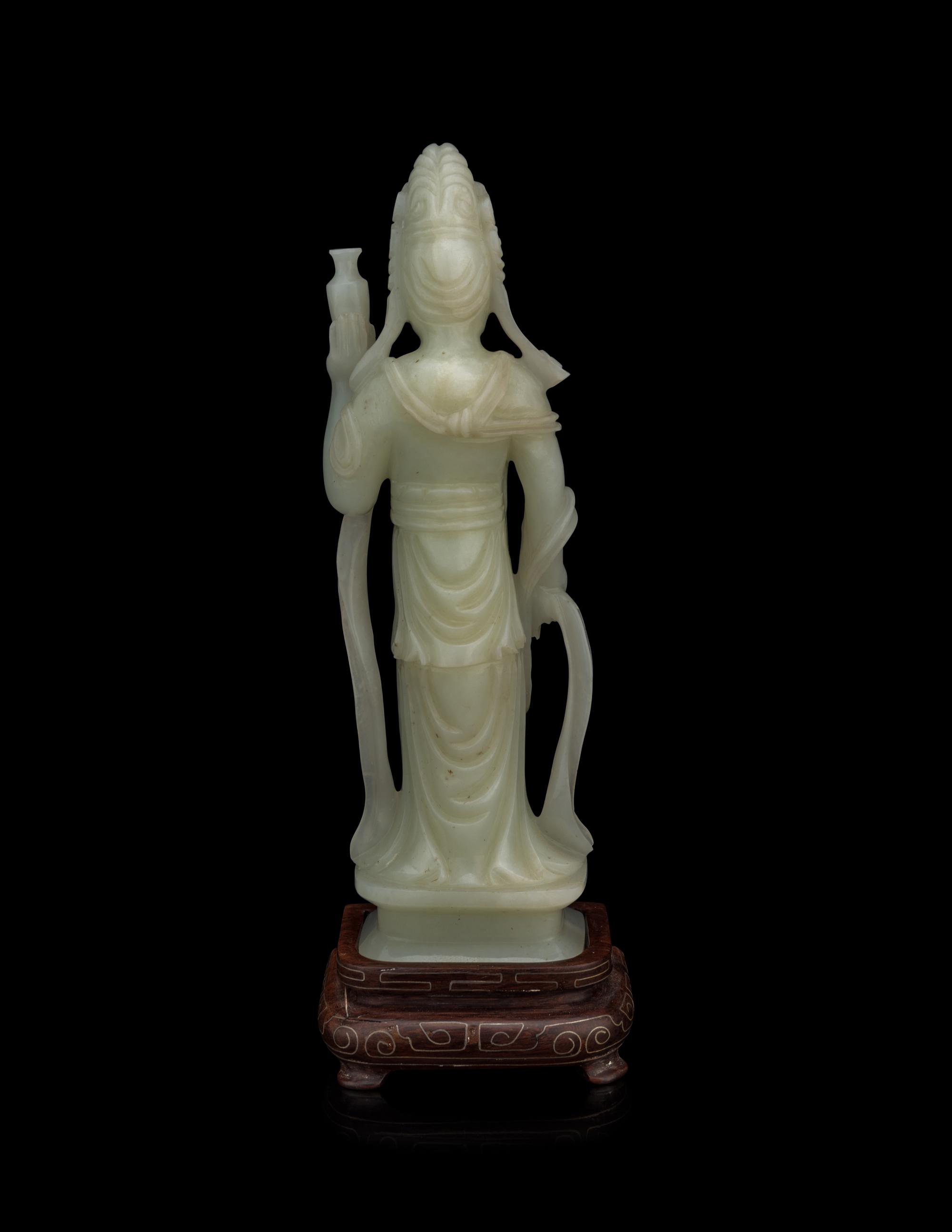 A Pale Celadon Jade Figure of Standing Guanyin