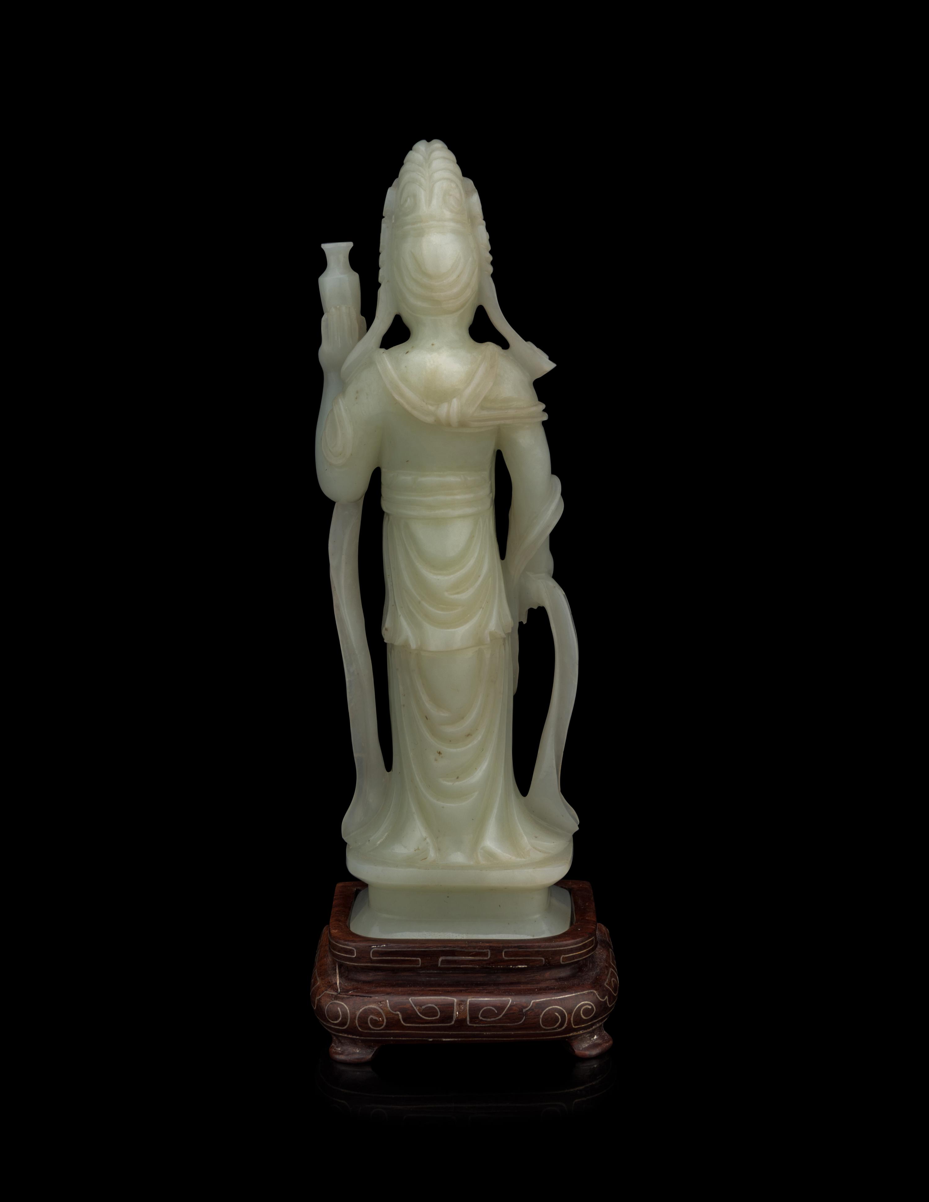 A Pale Celadon Jade Figure of Standing Guanyin