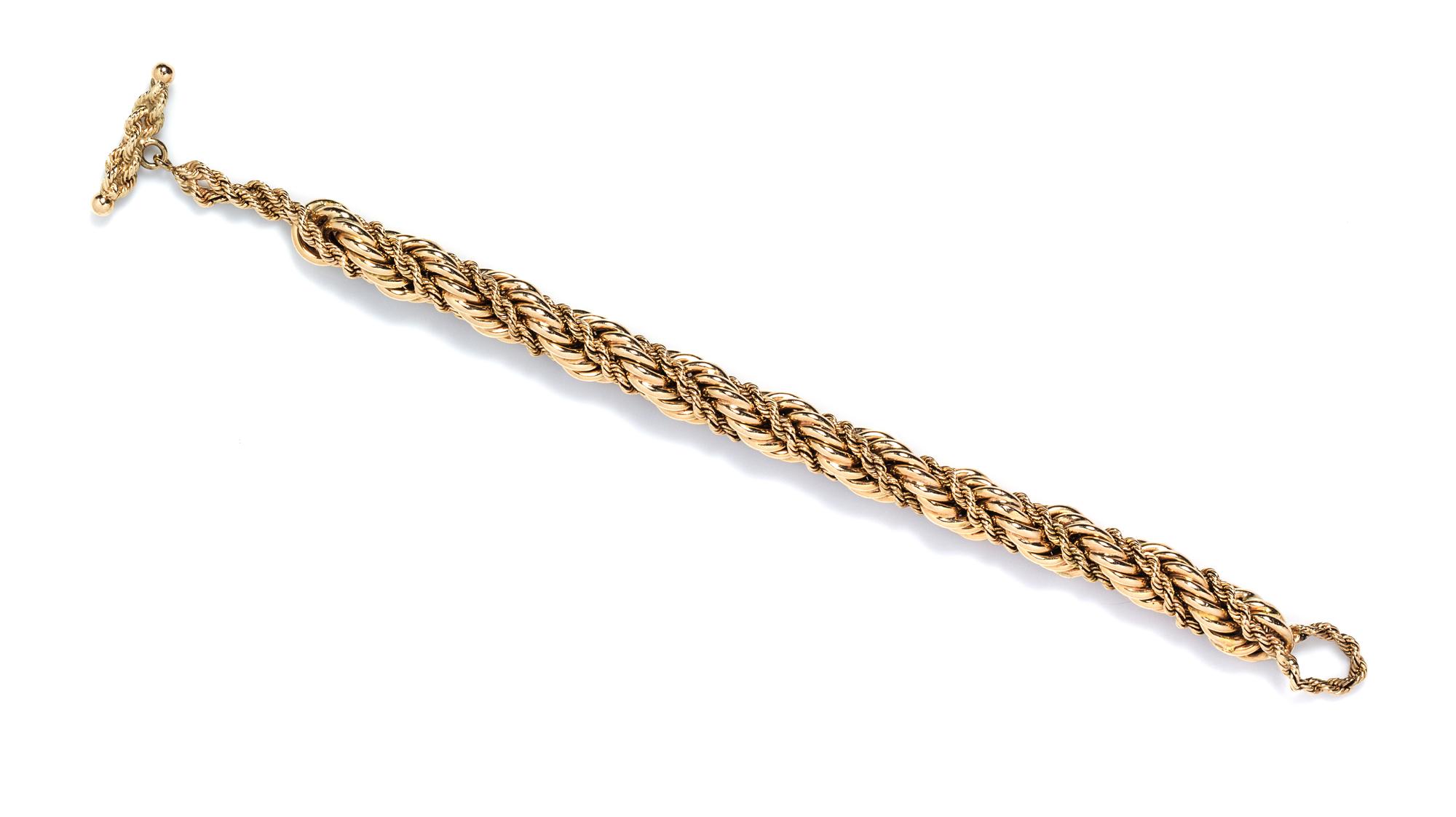 A Yellow Gold Twisted Rope Toggle Bracelet, 28.30 dwts.