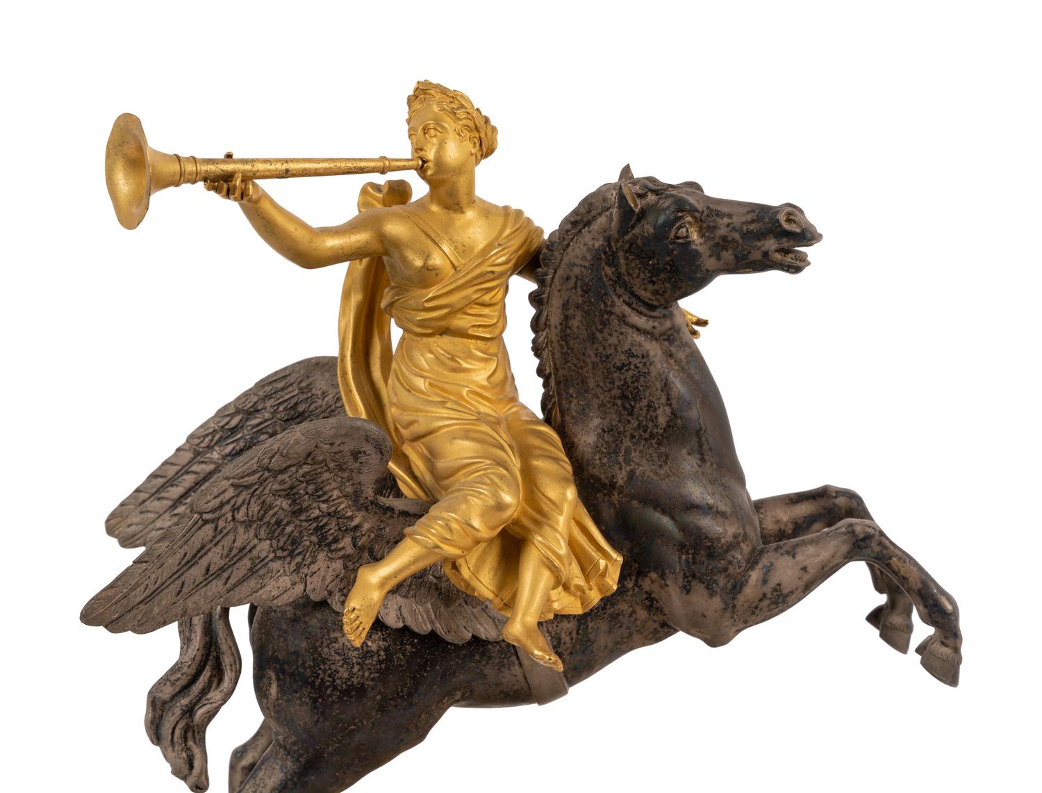 A Louis Philippe Gilt Bronze and Steel Figural Mantel Clock