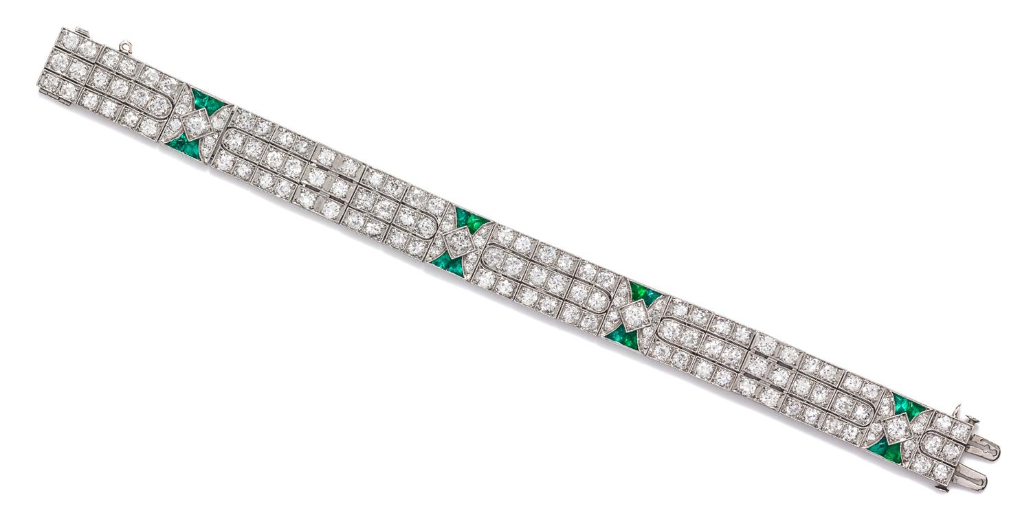 An Art Deco Platinum, Diamond, and Simulated Emerald Bracelet, 19.10 dwts.