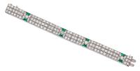 An Art Deco Platinum, Diamond, and Simulated Emerald Bracelet, 19.10 dwts.
