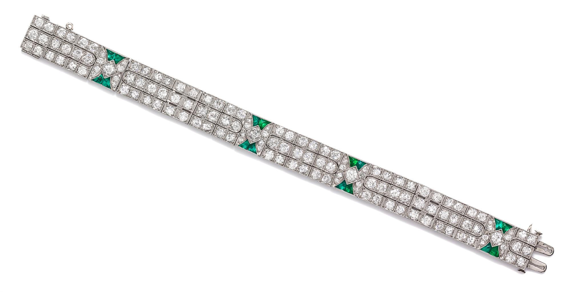 An Art Deco Platinum, Diamond, and Simulated Emerald Bracelet, 19.10 dwts.