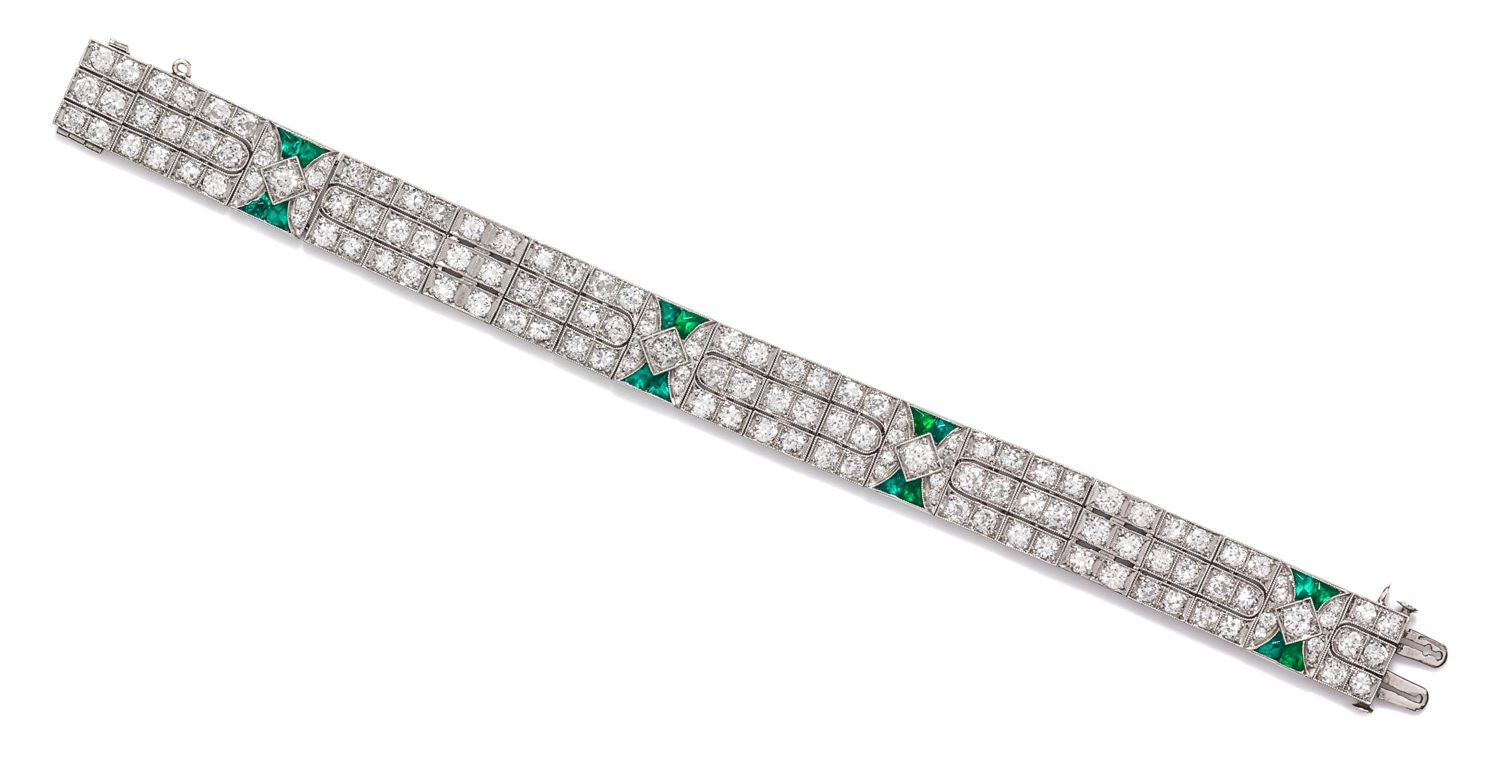 An Art Deco Platinum, Diamond, and Simulated Emerald Bracelet, 19.10 dwts.
