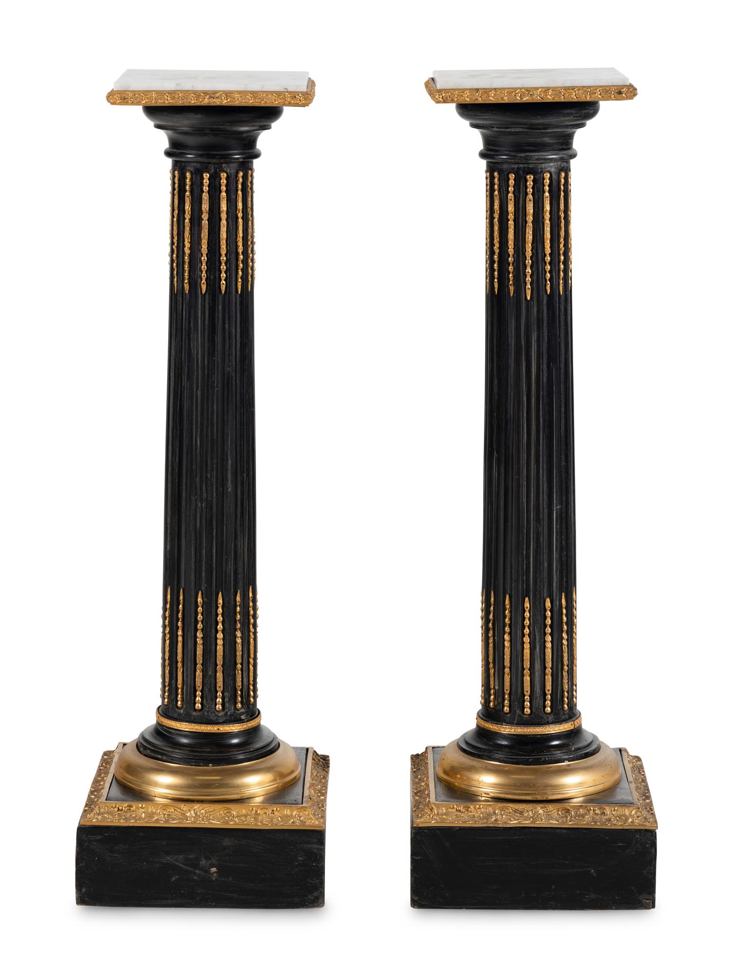 A Pair of Gilt Metal Mounted Marble-Top Pedestals
