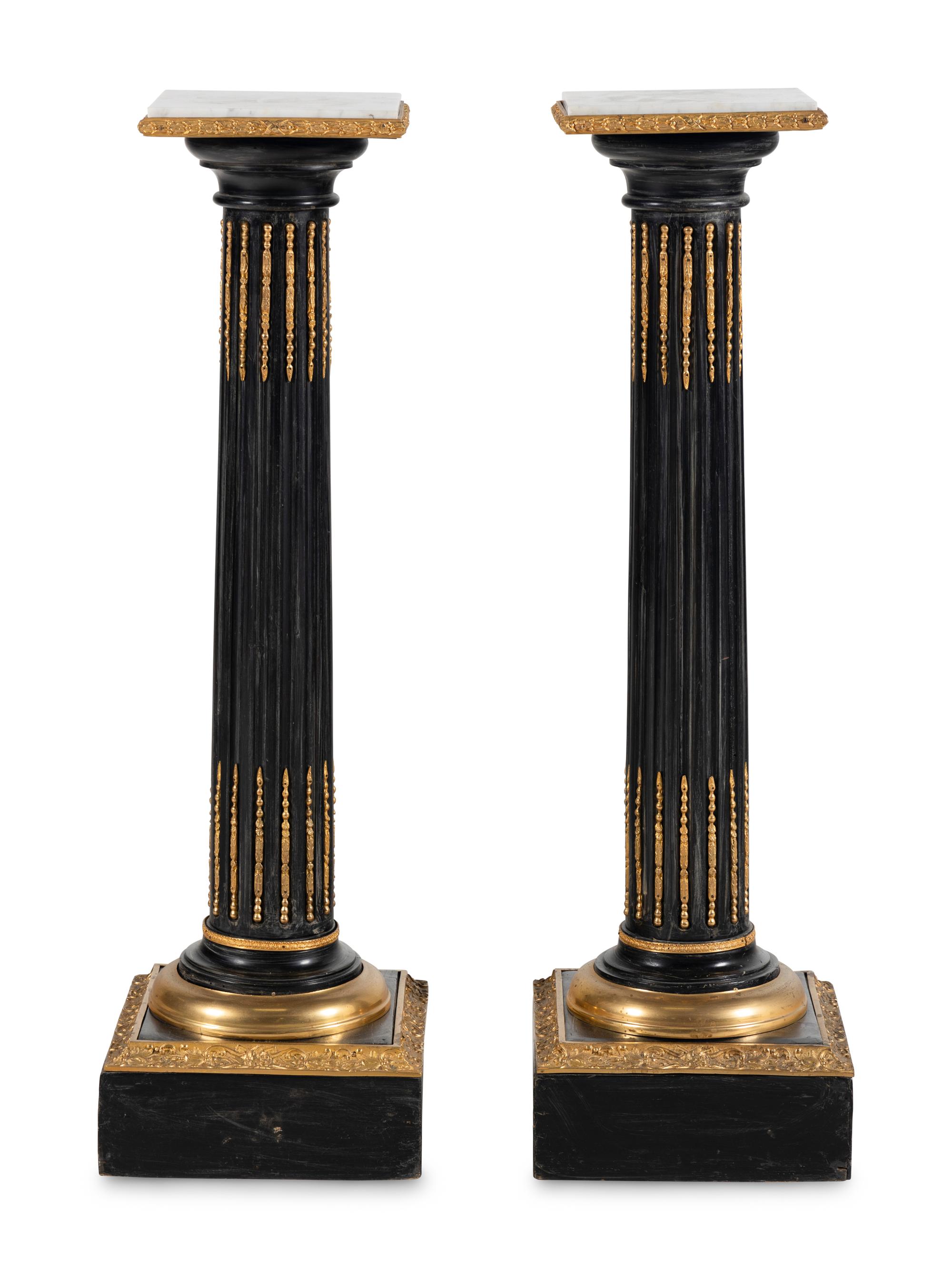 A Pair of Gilt Metal Mounted Marble-Top Pedestals