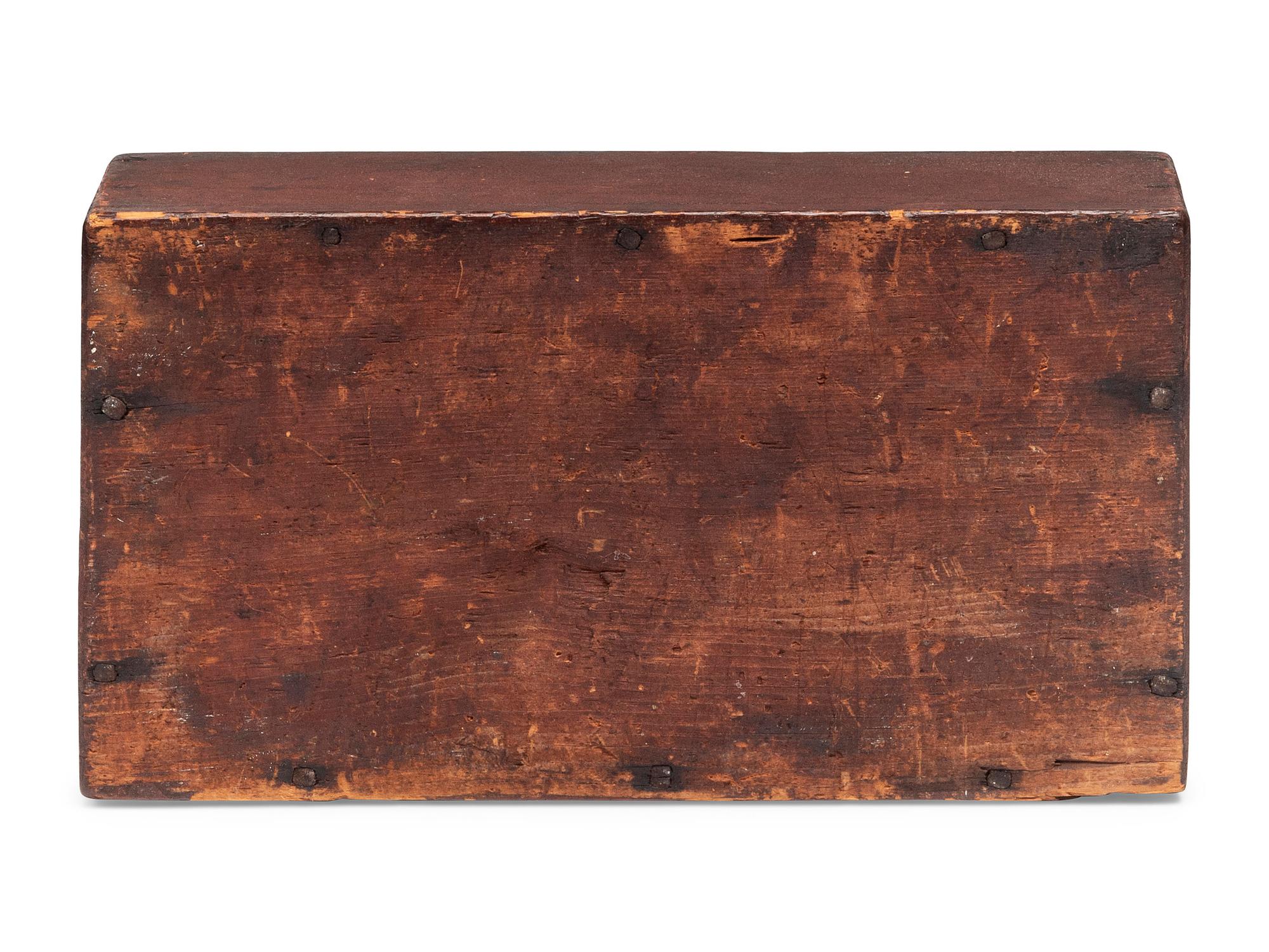 A Queen Anne Carved and Red Painted Pine Hanging Wall Box