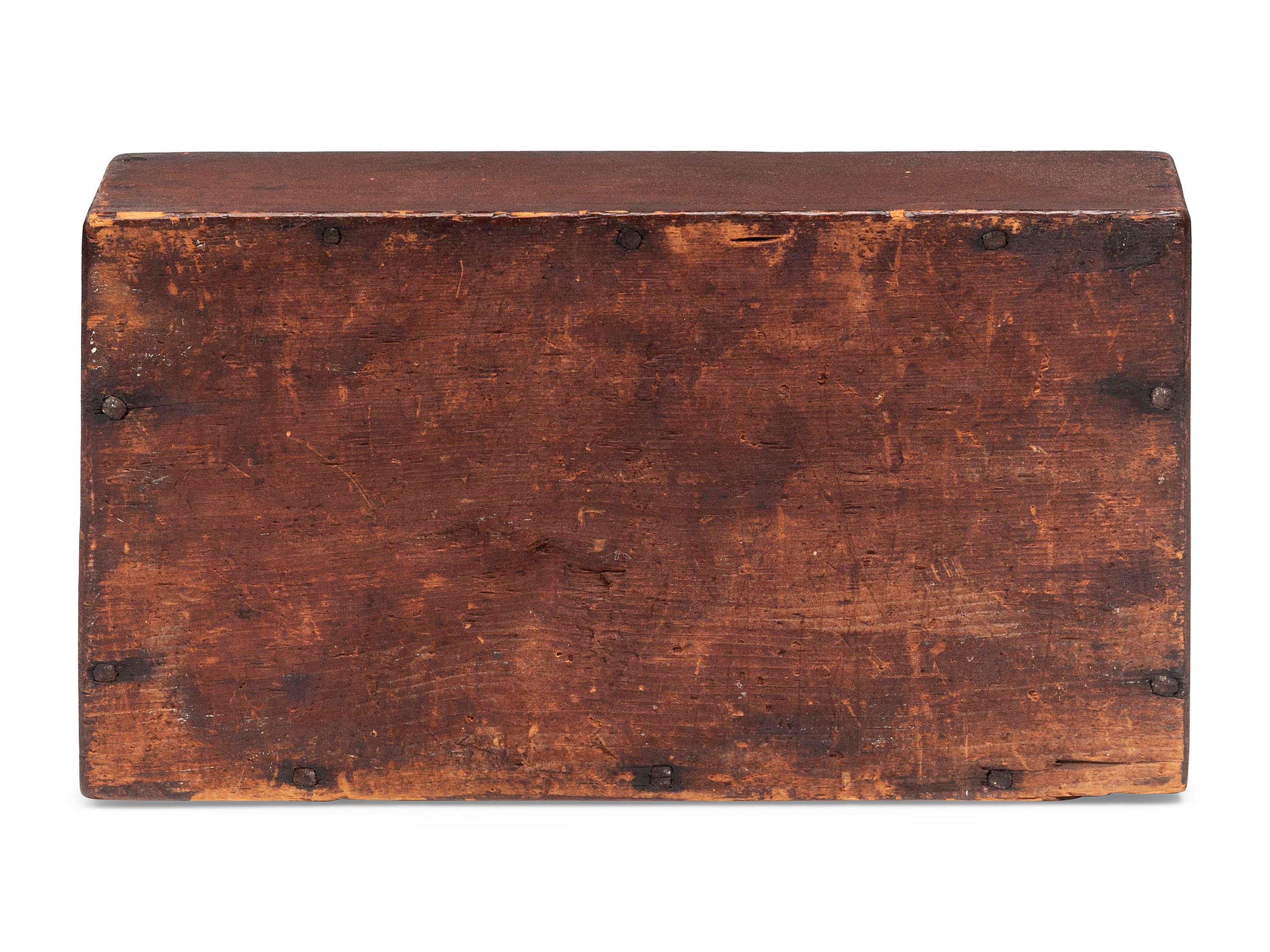 A Queen Anne Carved and Red Painted Pine Hanging Wall Box
