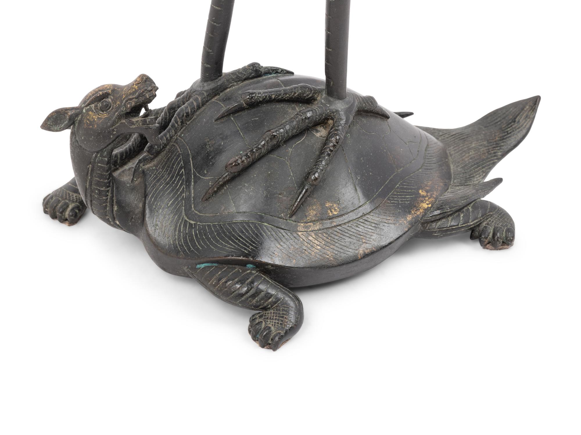 A Japanese Bronze Figural Group of a Crane and a Turtle