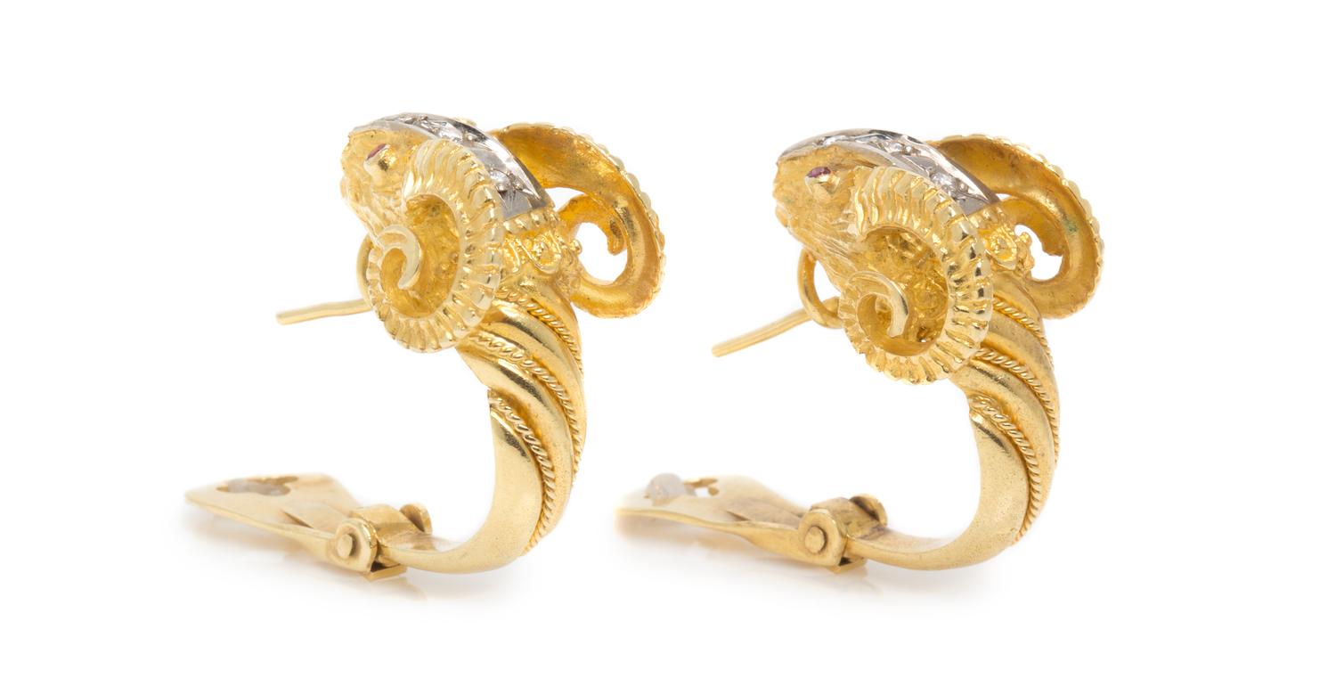 An 18 Karat Yellow Gold, Diamond and Ruby Ram's Head Demi Parure, 65.65 dwts.