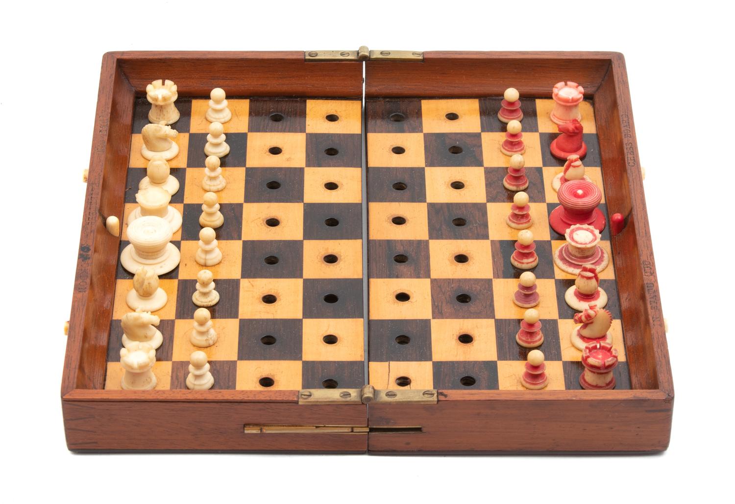 A French Chess Set in Leather Travel Case Length 10 inches. — LATE 19TH CENTURY