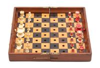 A French Chess Set in Leather Travel Case Length 10 inches. — LATE 19TH CENTURY